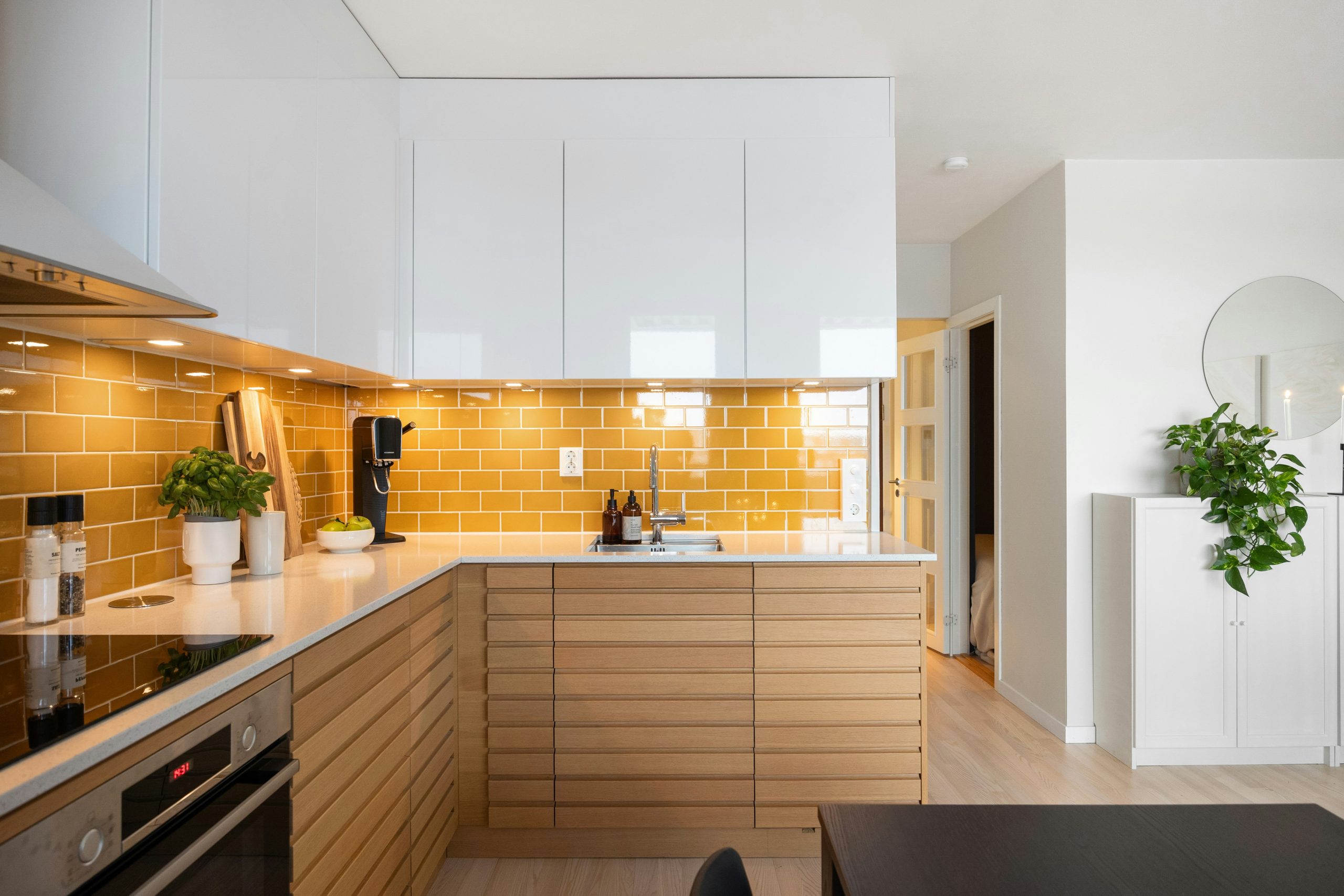 A kitchen with a stove top oven sitting inside of it