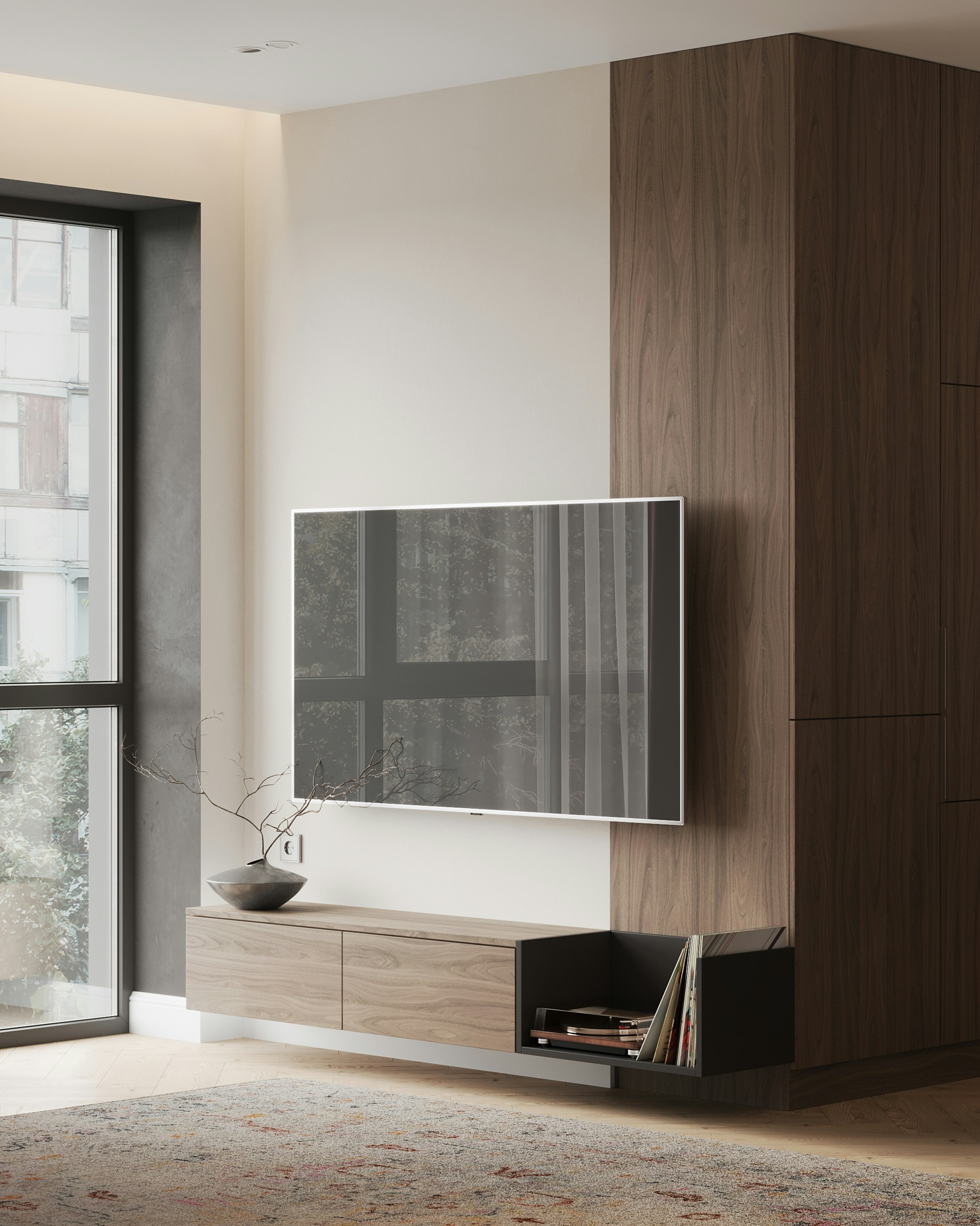 A living room with a large television on a wall
