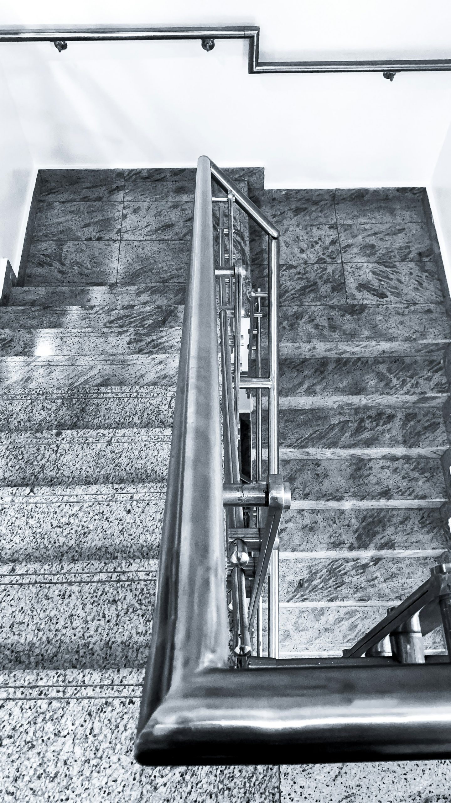A marble staircase in an office.