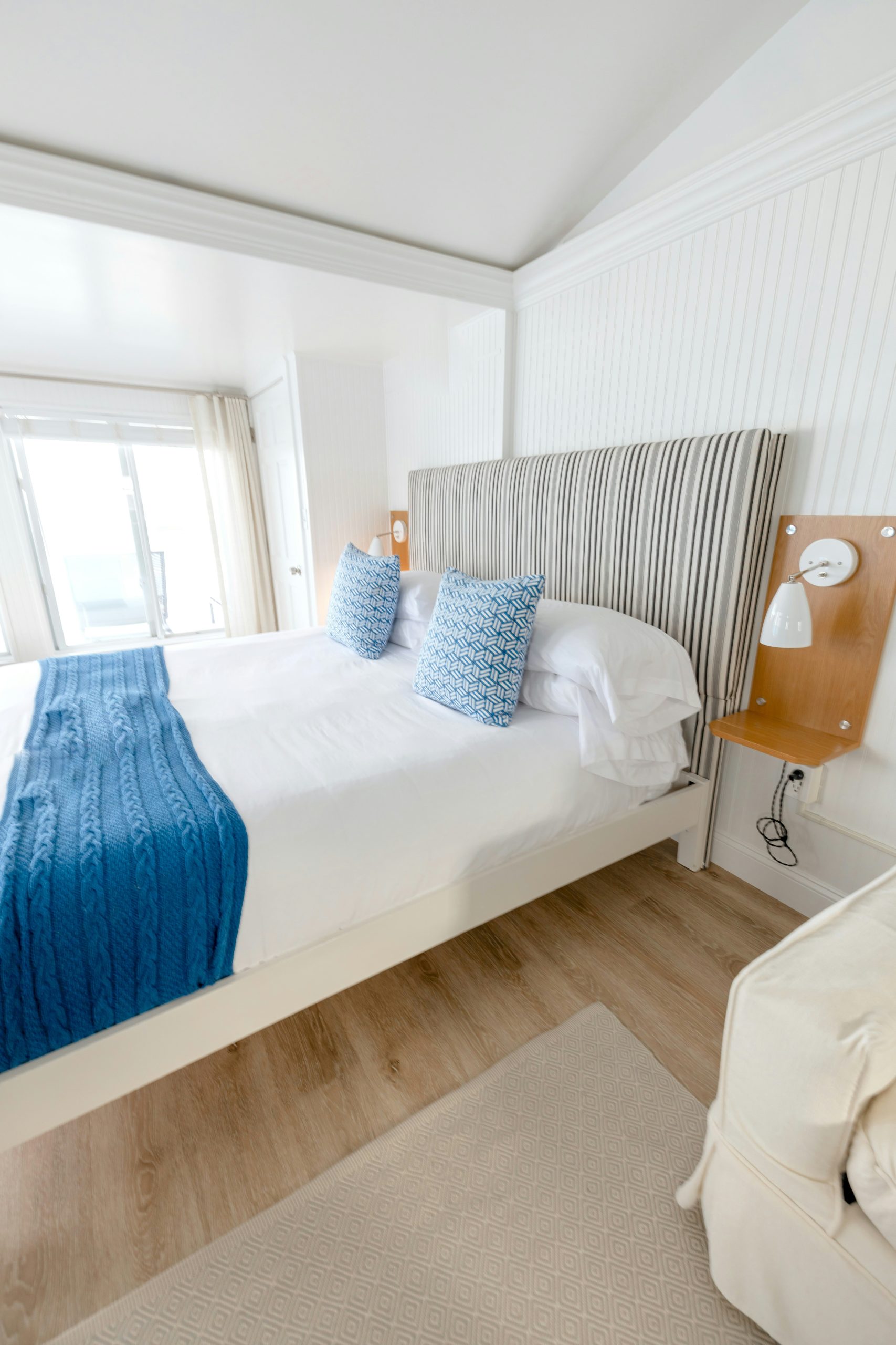 Bright and airy bedroom interior design in modern hotel
