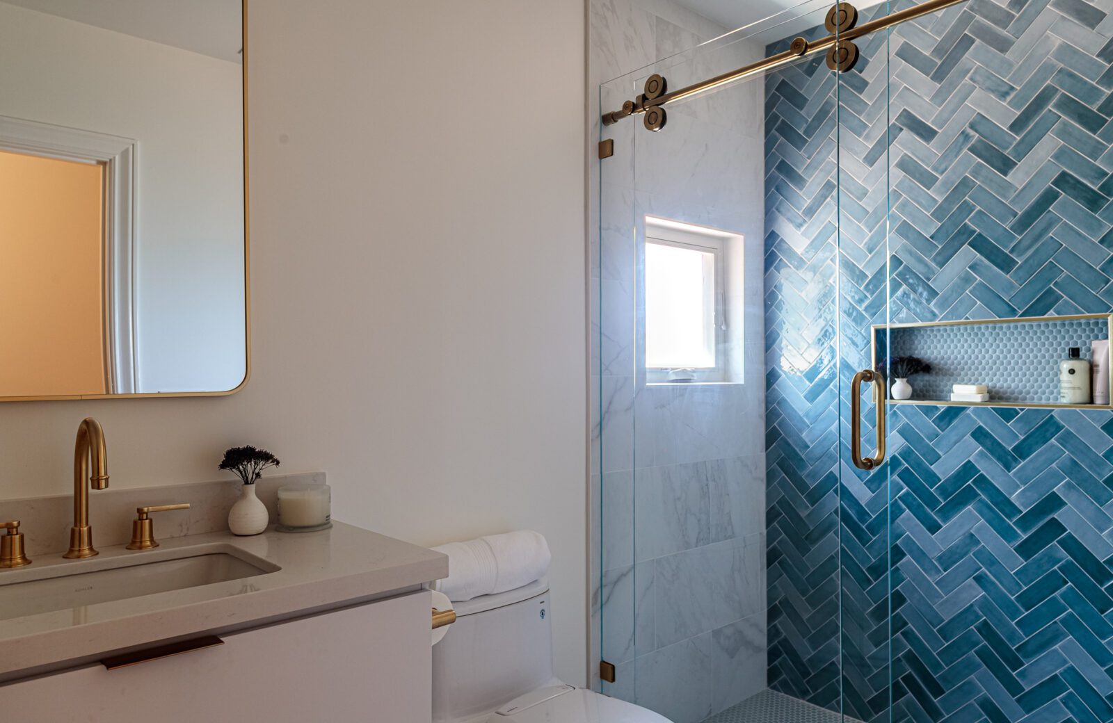En Suite Bathroom Remodels with Blue and White Tile - MSK Design Build