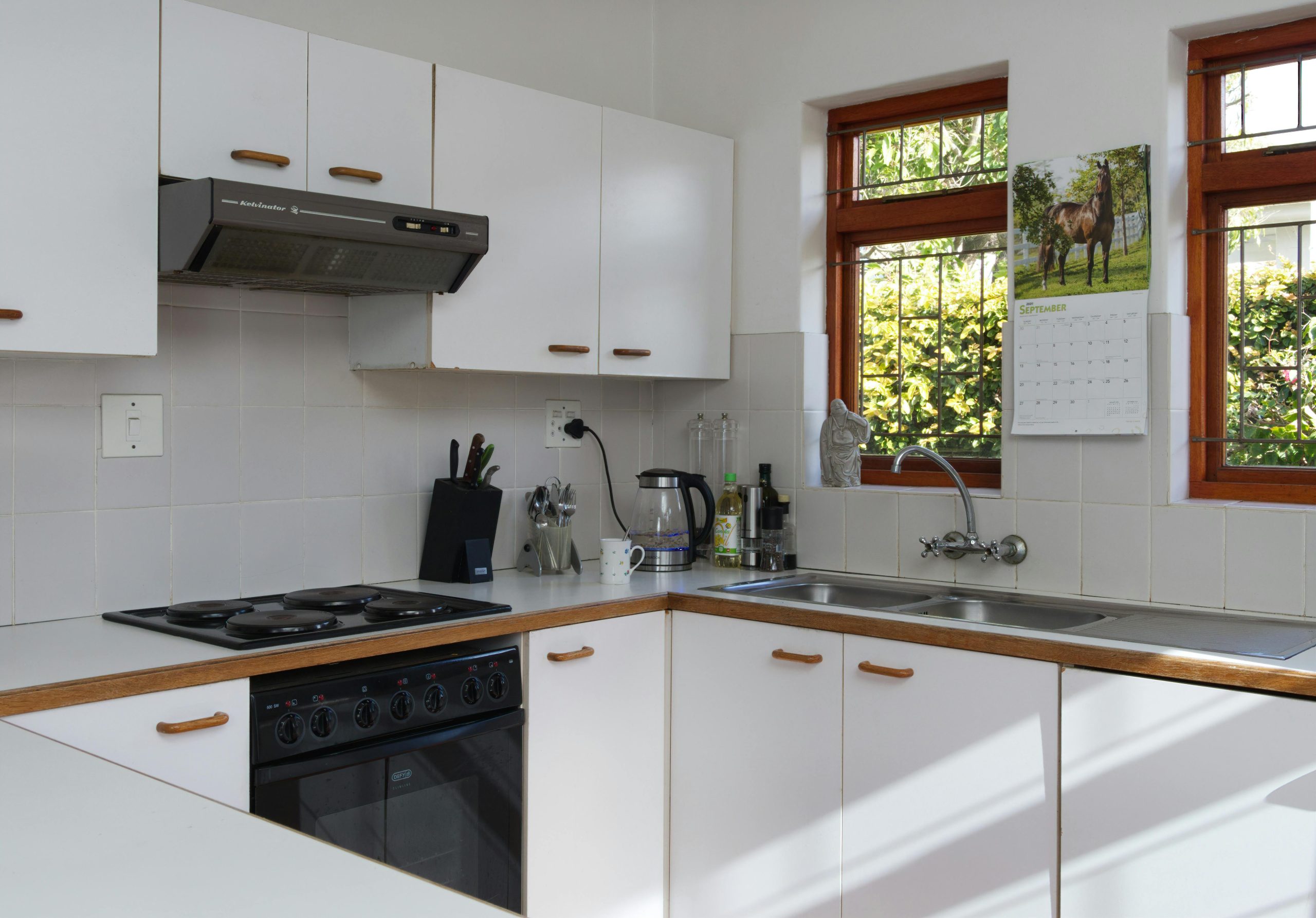 Stylish kitchen interior featuring contemporary appliances and natural lighting.