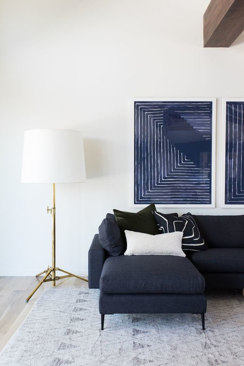 6 Navy Blue Living Room Ideas That'll Convince You The Bold Hue Is Actually A Neutral
