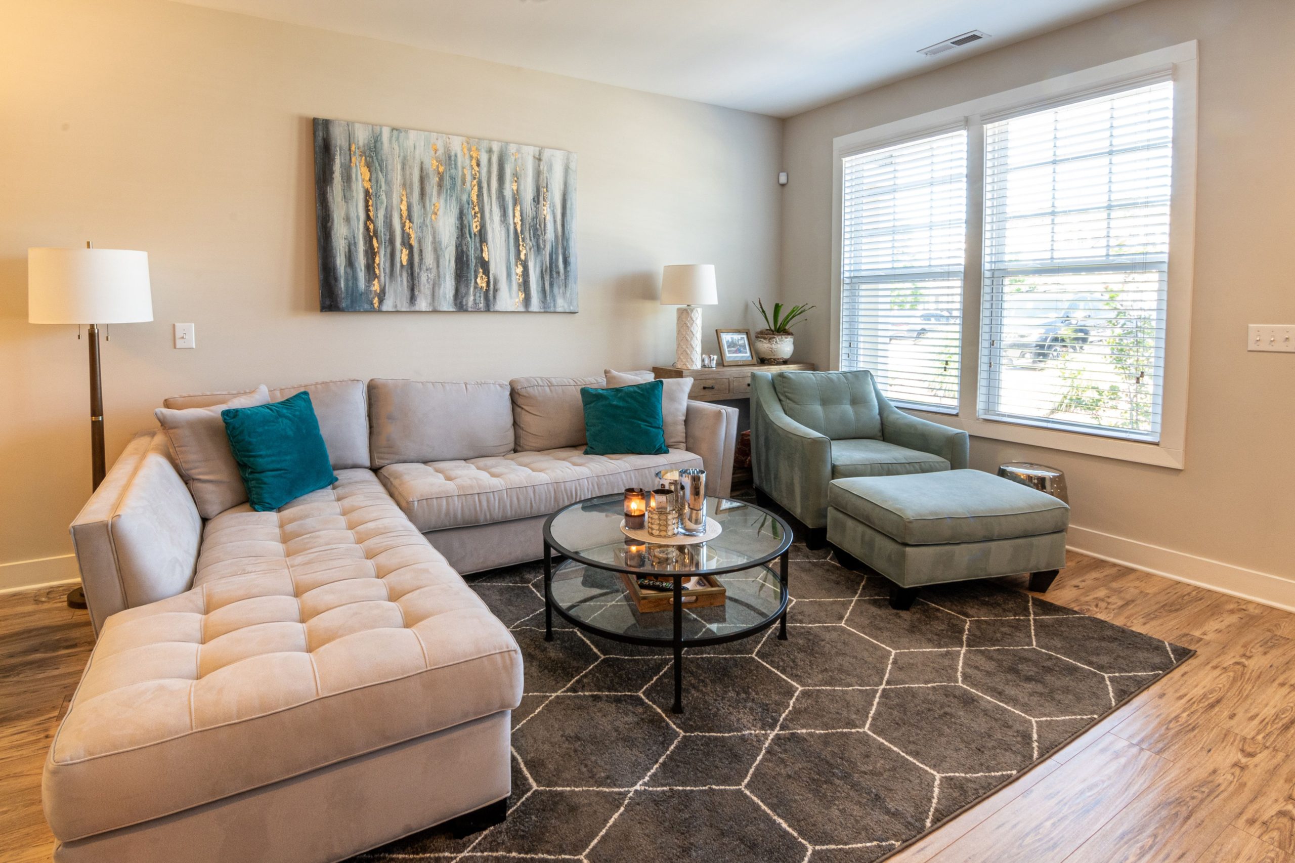 A bright and stylish minimalist living room featuring modern furniture and decor.