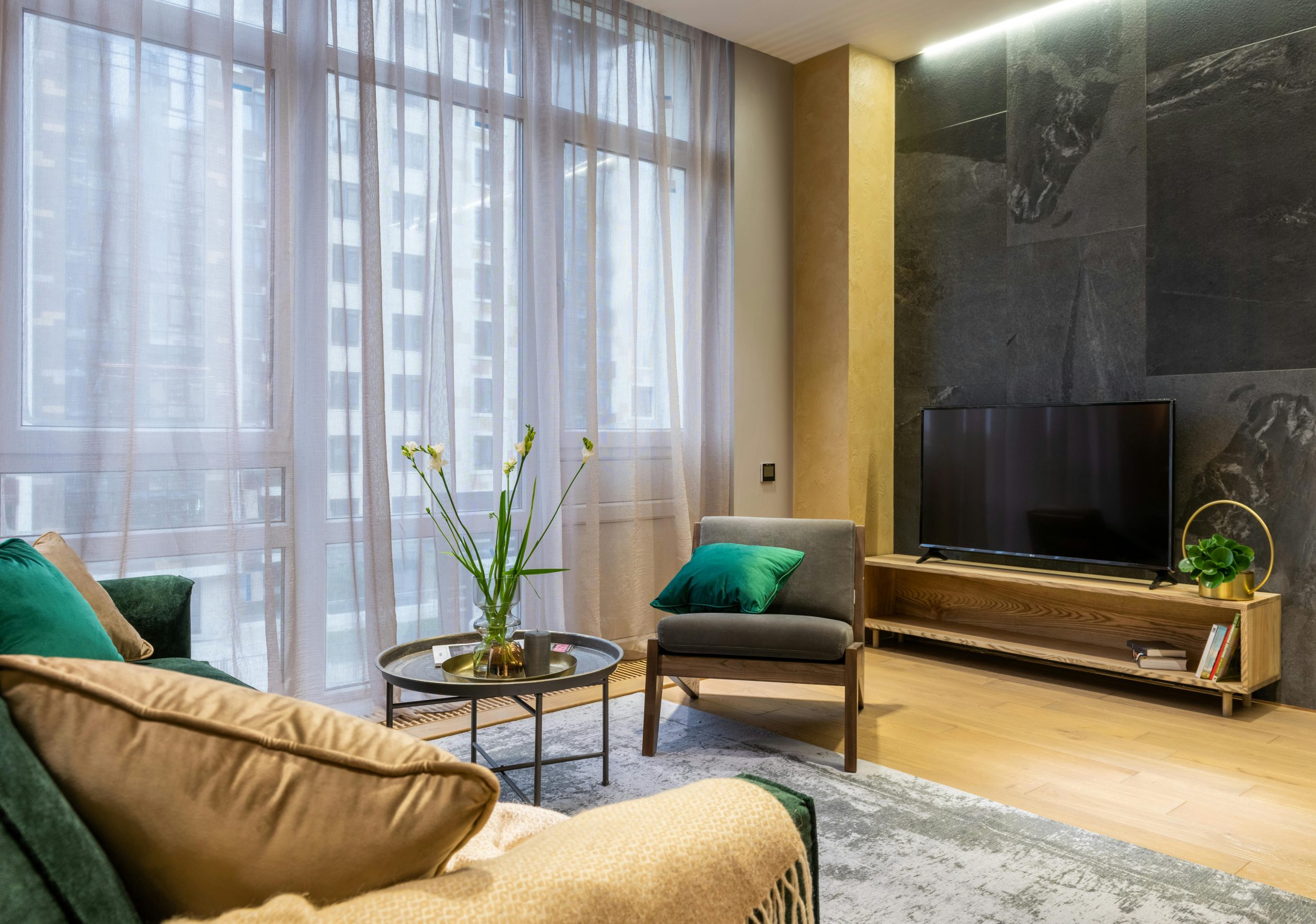 A luxurious living room featuring modern interior design with stylish furniture and decor.