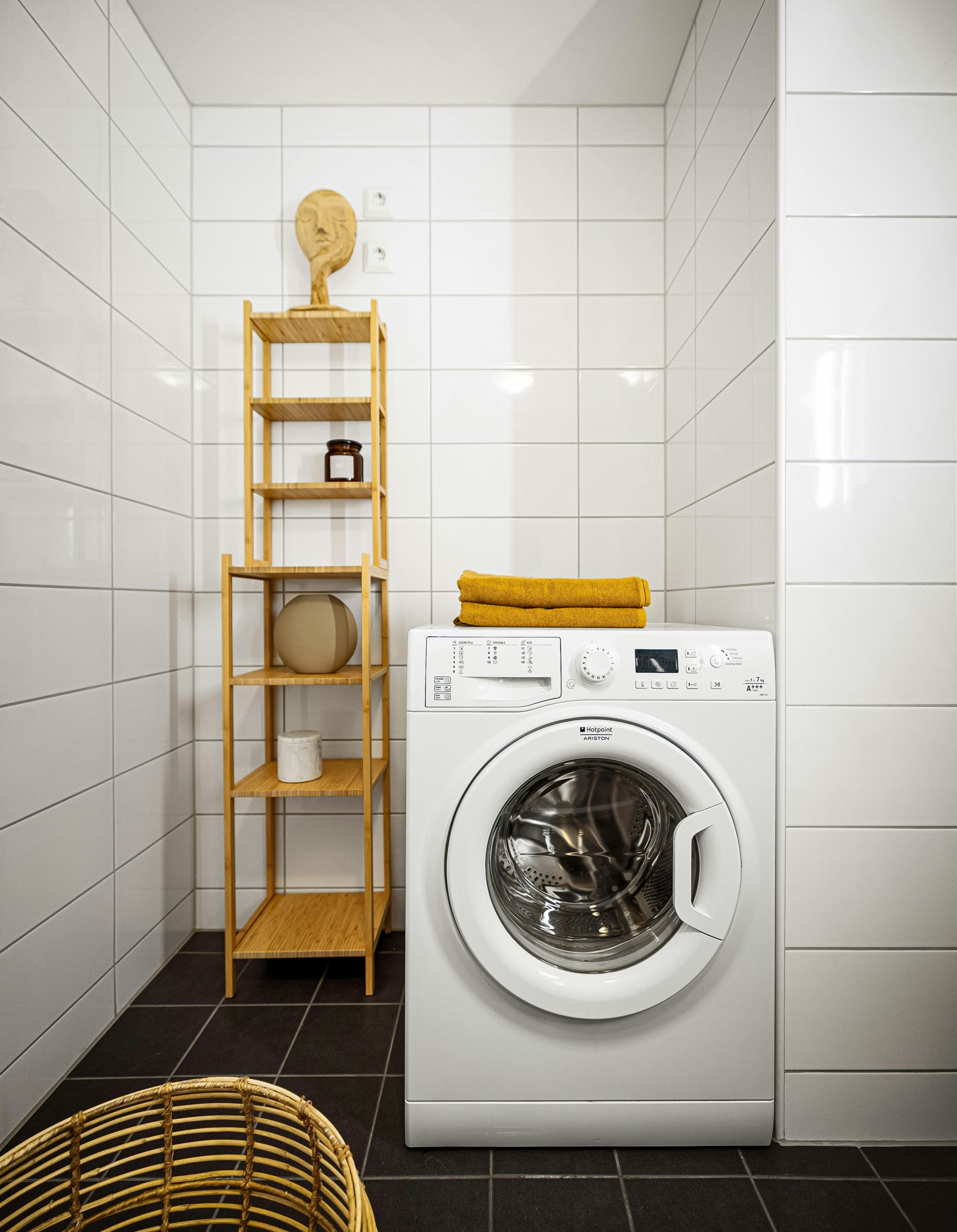 A washer and dryer in a small room