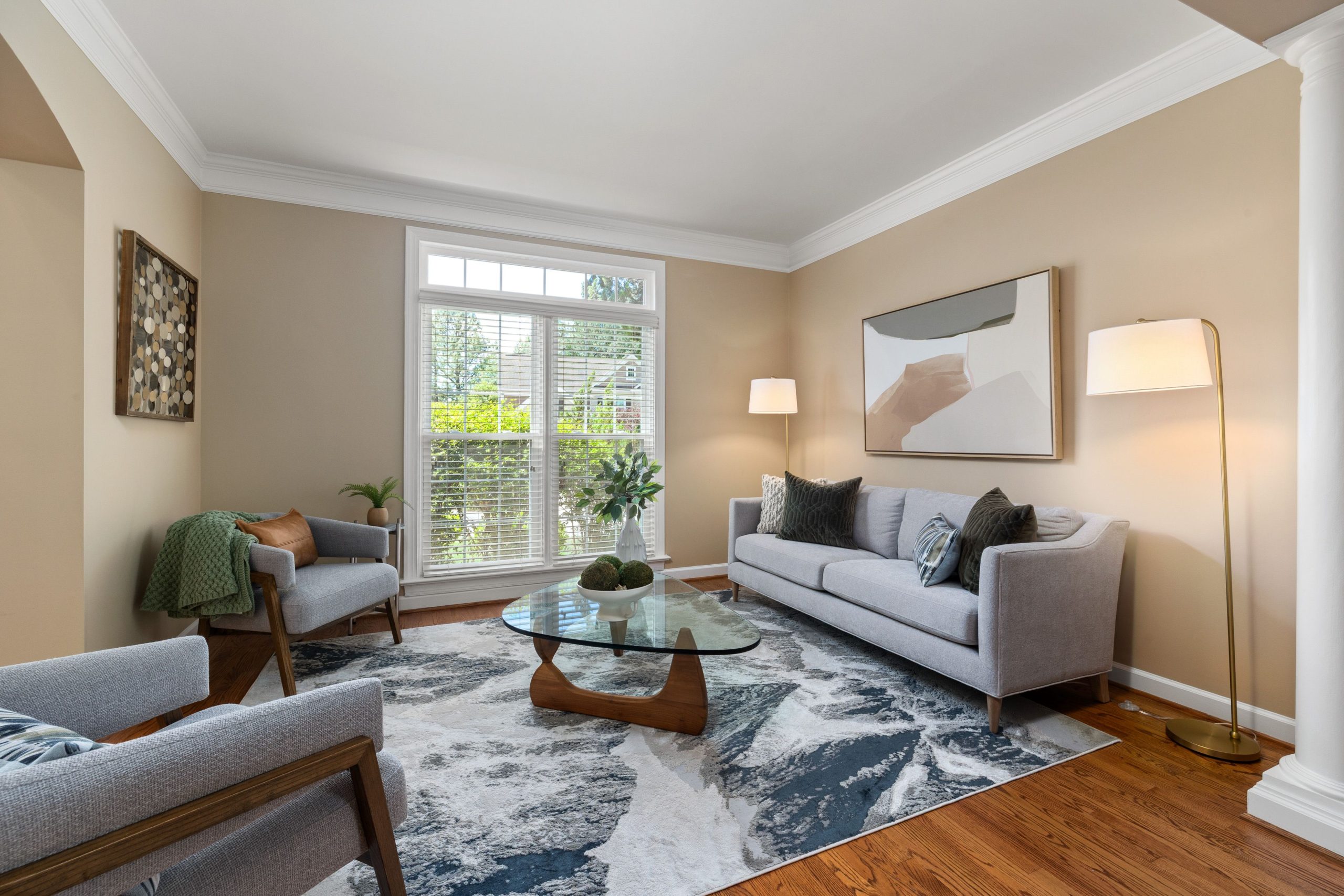 Bright living room featuring stylish furniture and modern design elements.