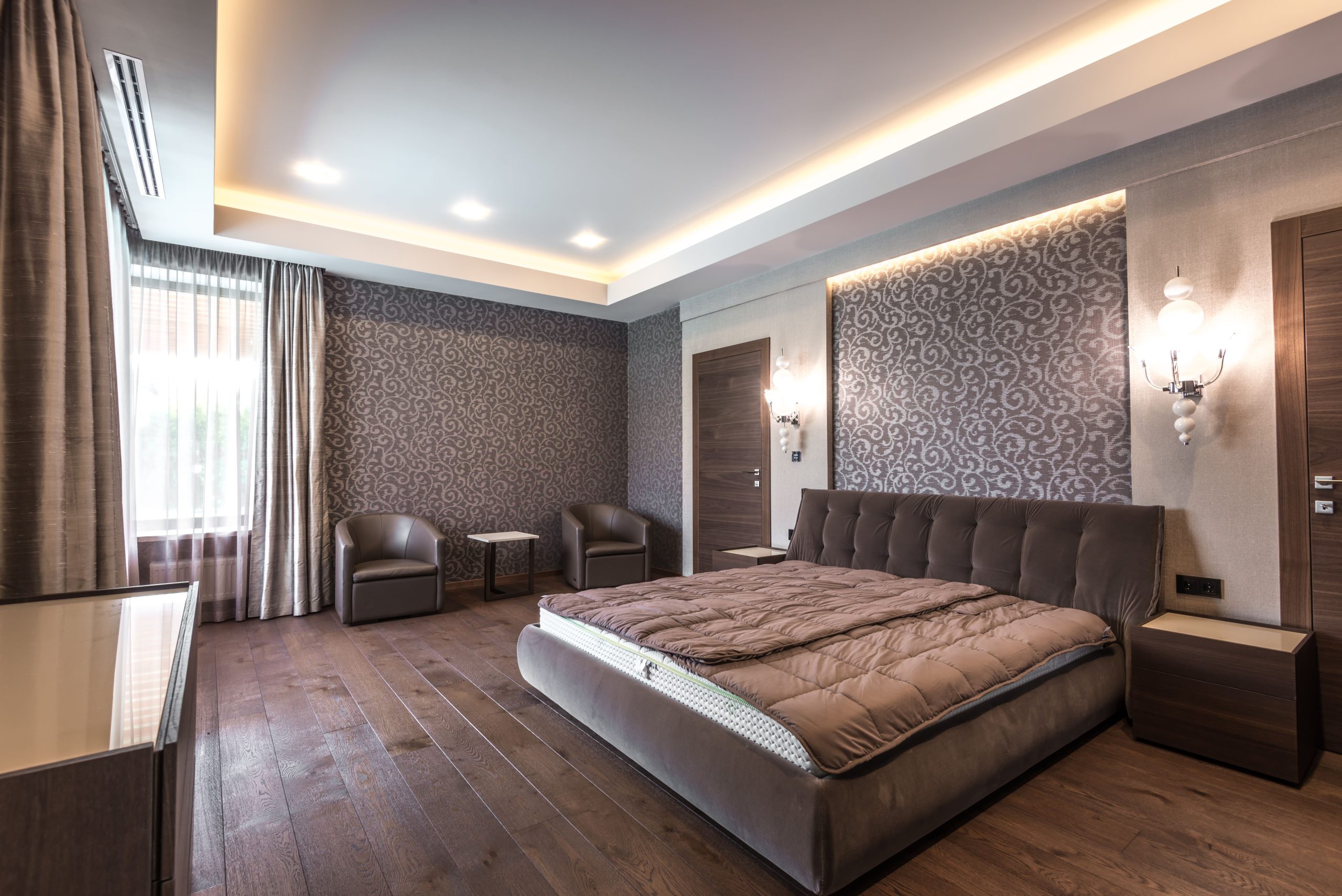 Elegant contemporary bedroom with brown tones and minimalist design. Perfect for interior design inspiration.