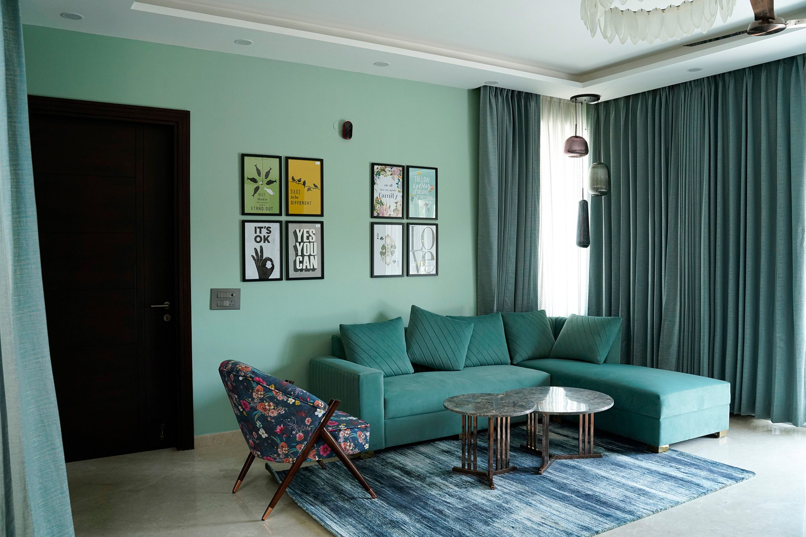 Living Room Modern Wall Paint Design with Mint Green Walls | Livspace