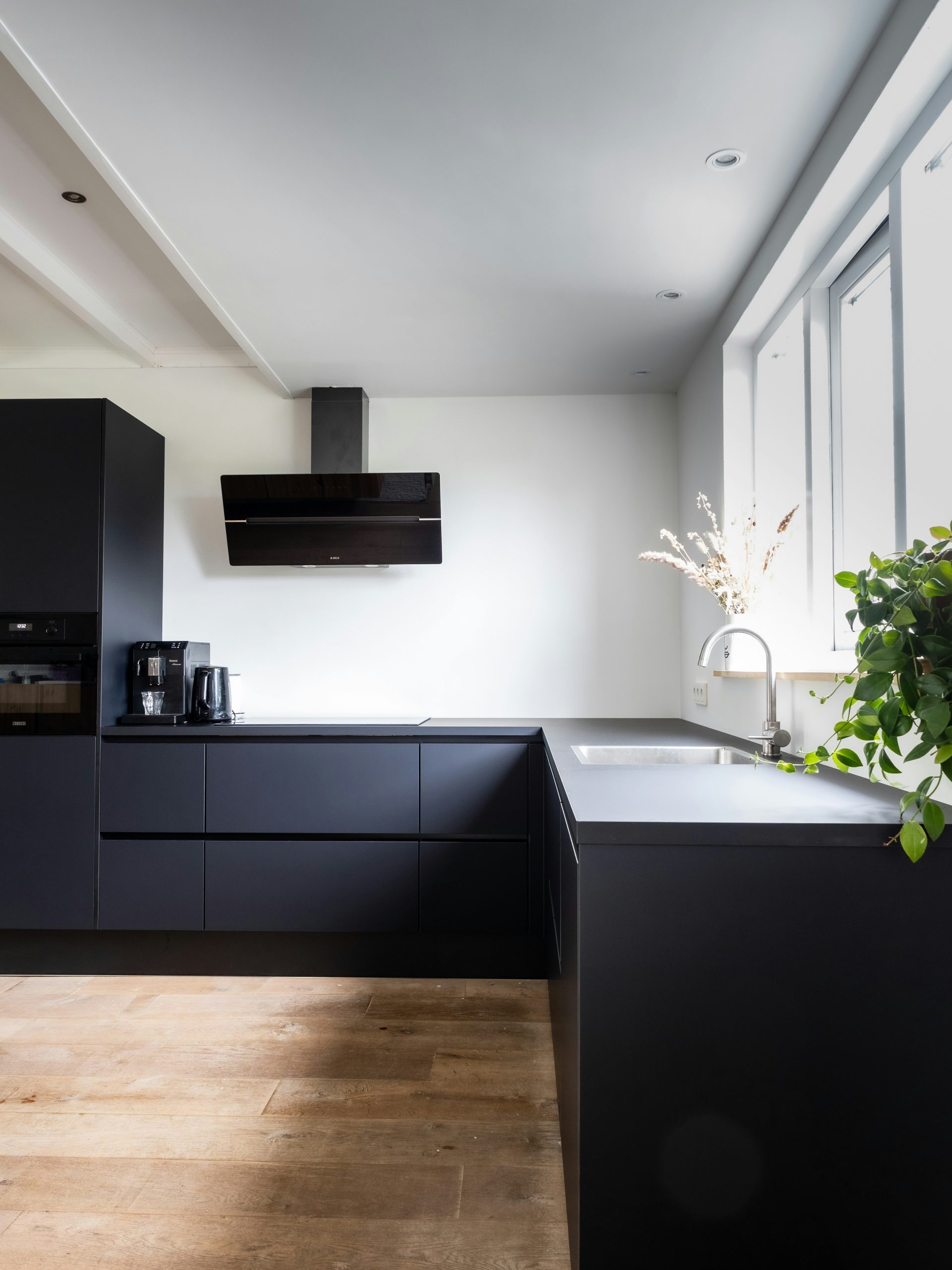 Our modern black kitchen despite being black is very bright.