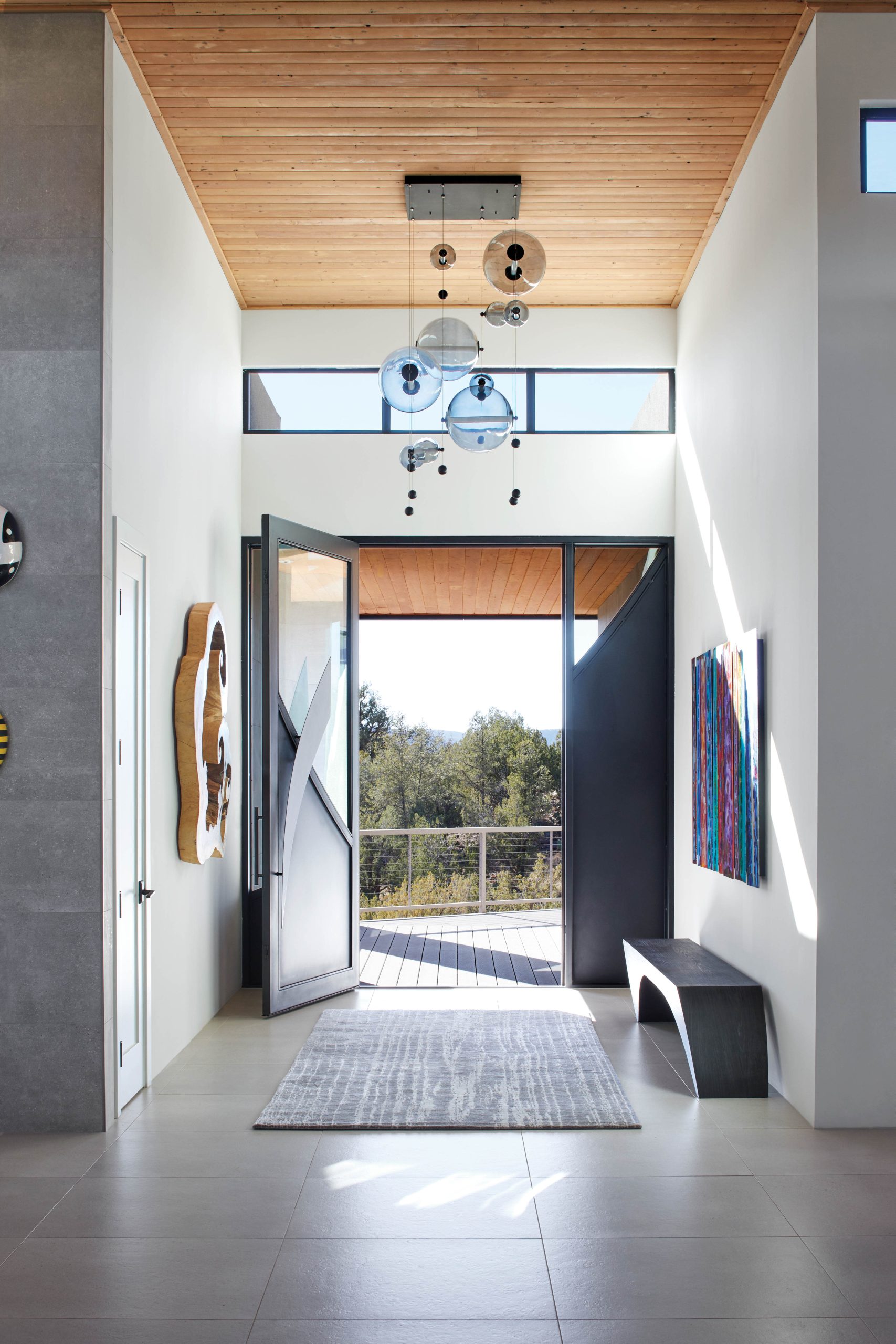 Pale Blue Transitional Foyer and Staircase | LUXE Interiors + Design