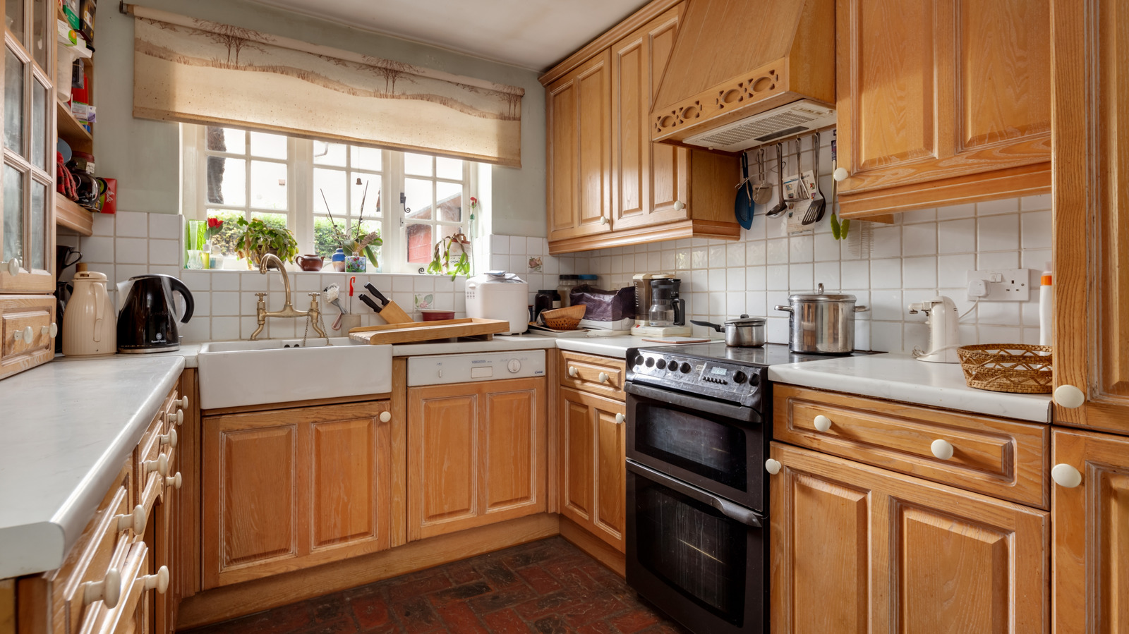 Skip The Stain And Paint: A Smarter Way To Update Honey Oak Cabinets