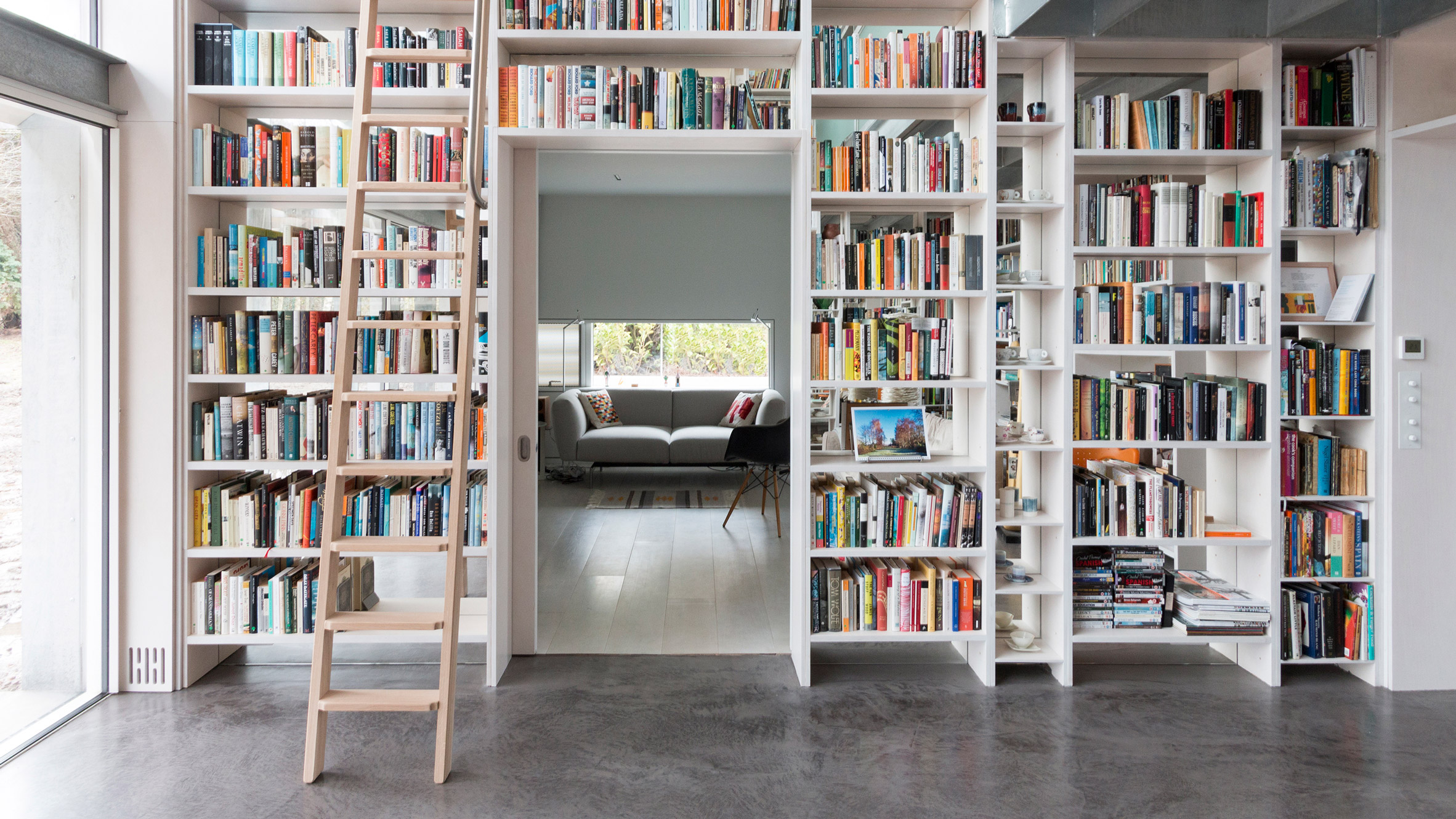 Ten practical home libraries that showcase their owners' book collections