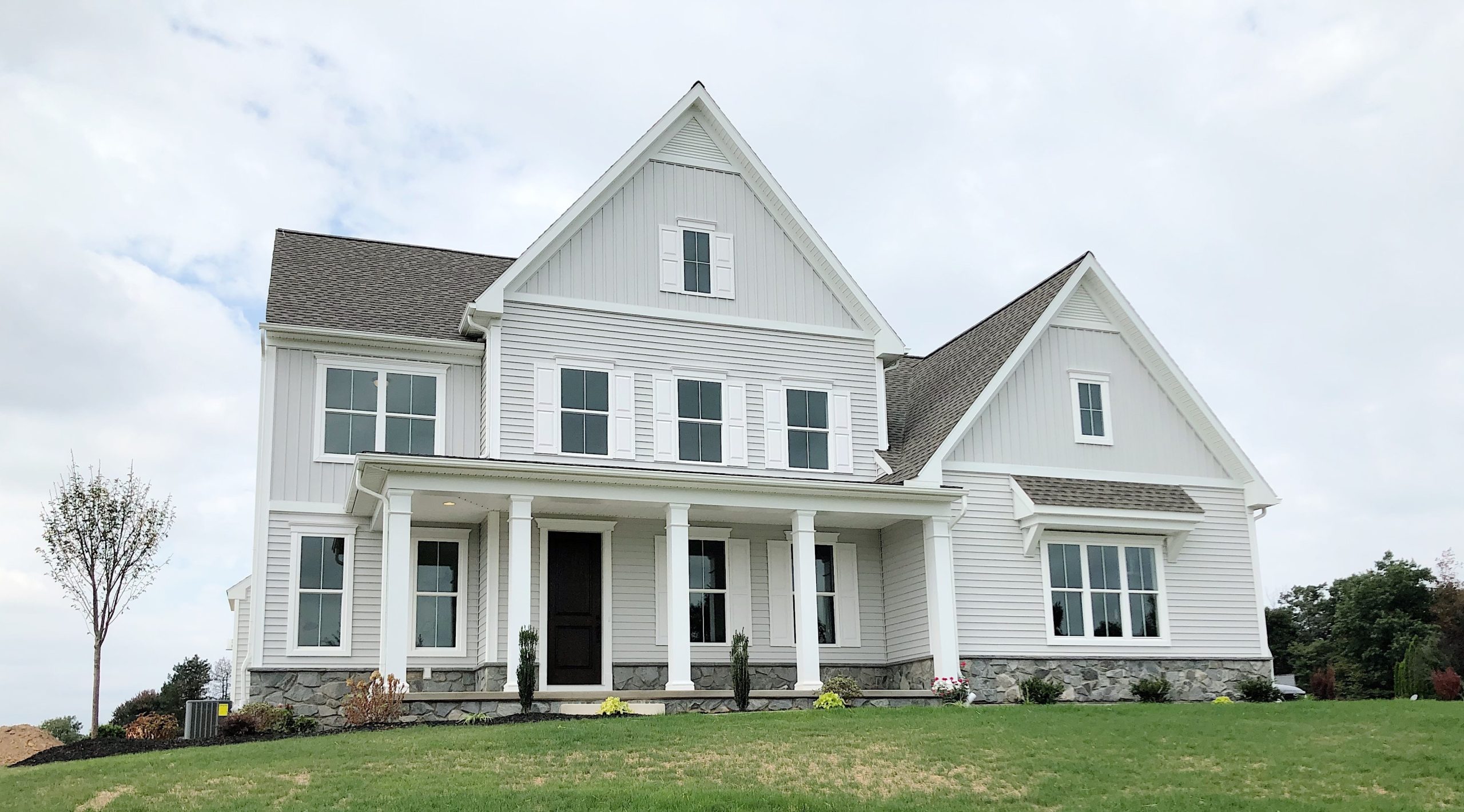 7 Modern Farmhouse Exterior Design Ideas | Custom Home Group