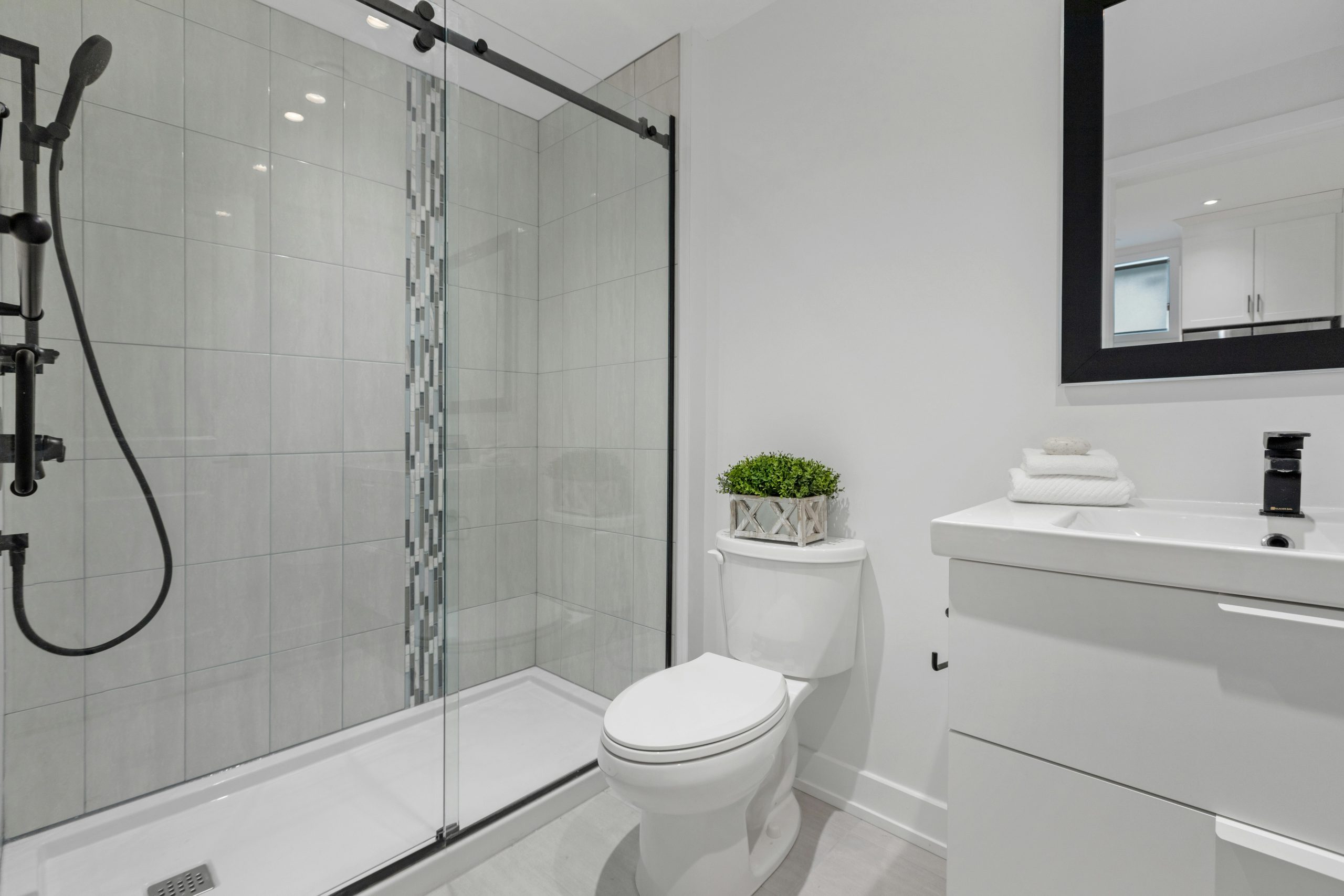 a bathroom with a glass shower
