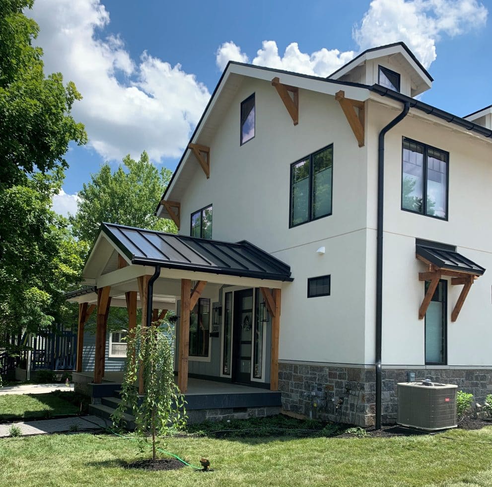 Modern farmhouse facelift topped by eye-catching metal panels