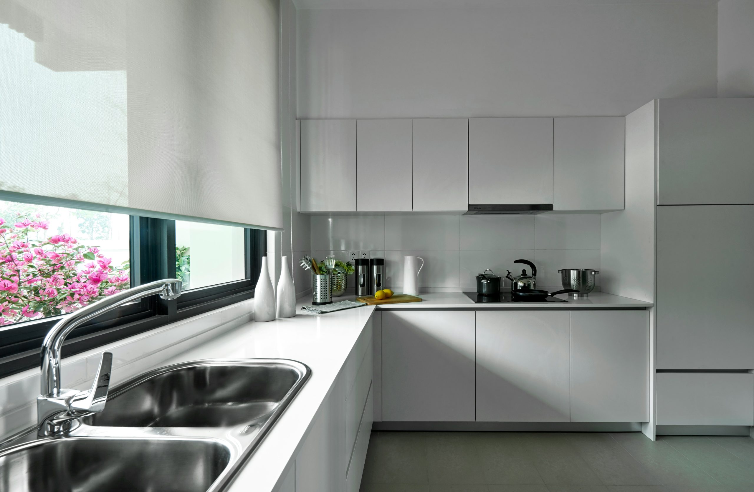 stainless steel sink near window